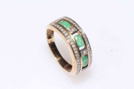 Emerald and diamond 9 carat gold ring, size R.
