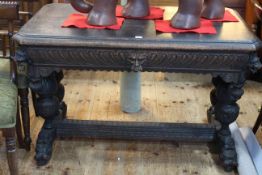 Victorian rectangular carved oak centre table having frieze drawer,