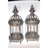Pair of metal and glazed hanging lanterns, 60cm high.