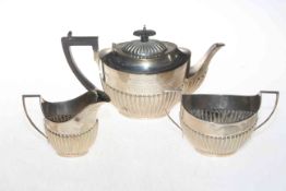 Three piece silver tea set with part fluted bodies, Sheffield 1918.