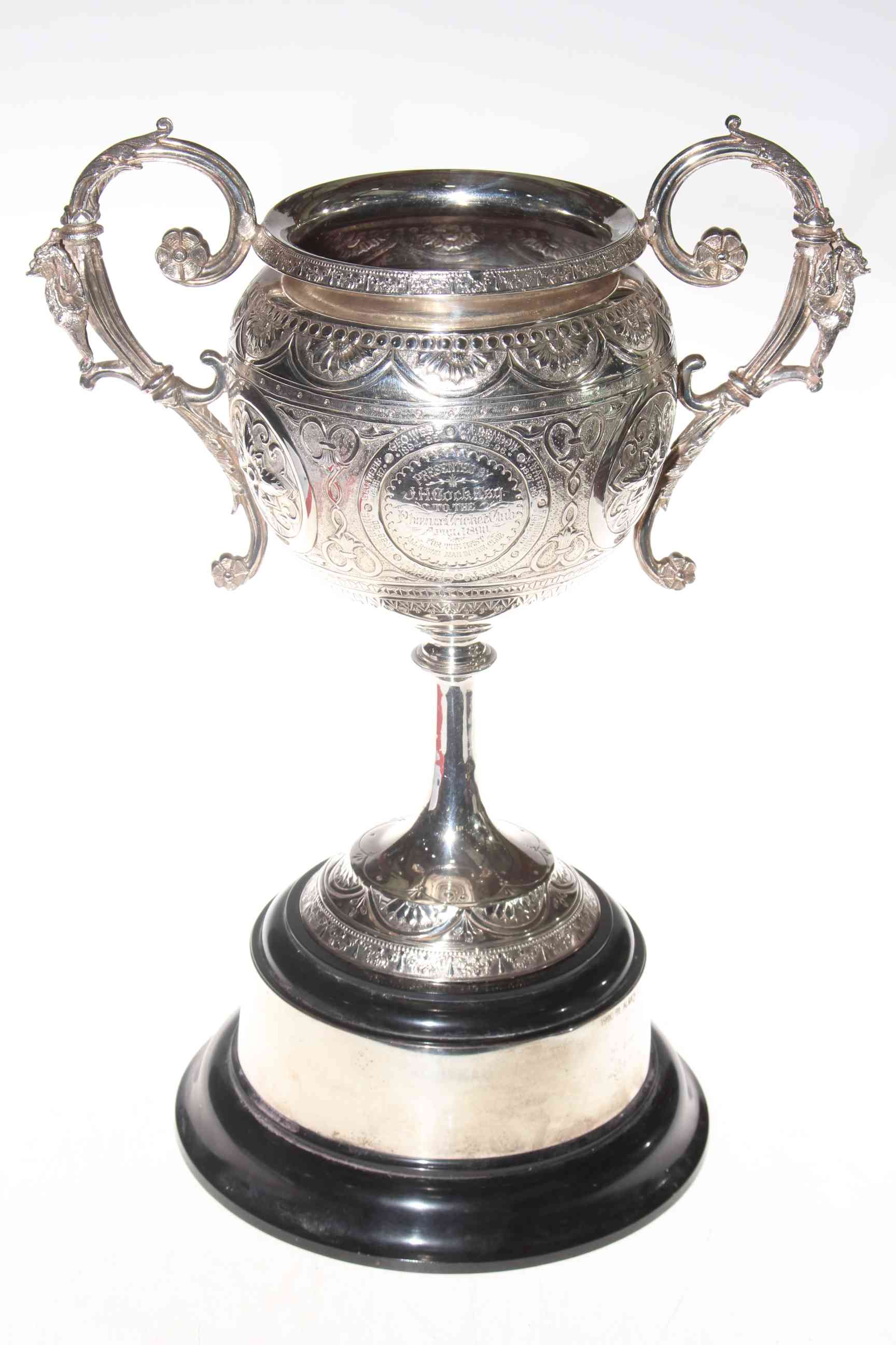 Victorian silver plated ornate trophy cup, presented to Phoenix Cricket Club 1890, 39cm.