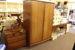 Four piece Stag Minstrel bedroom suite comprising two door wardrobe, five drawer chest,