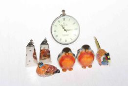 Spherical glass desk clock and novelty condiments.