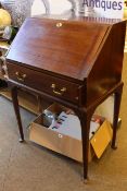 Mahogany single drawer bureau on cabriole legs.