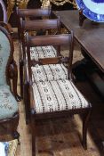 Set of six period mahogany bar back dining chairs on sabre legs.