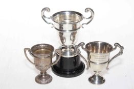 Three small silver trophy cups, the smallest for Dorset Counter Rink Champions 1936.