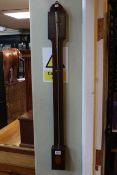 Antique inlaid mahogany stick barometer.