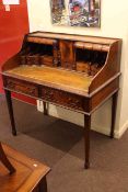 Well fitted mahogany two drawer writing desk, 110cm by 105cm by 61cm.