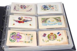 Album of assorted postcards including military embroidered silks, artist signed,