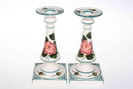 Pair of G. Hill Pottery Wemyss style candlesticks, 18cm.