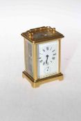 French matt gilt brass carriage clock with alarm movement, 14.5cm to top of handle.