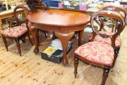 Late 19th/early 20th Century oval mahogany dining table on ball and claw legs,