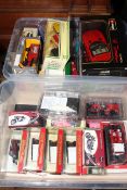 Two boxes of boxed model vehicles including Burago, Models of Yesteryear, Corgi, etc.