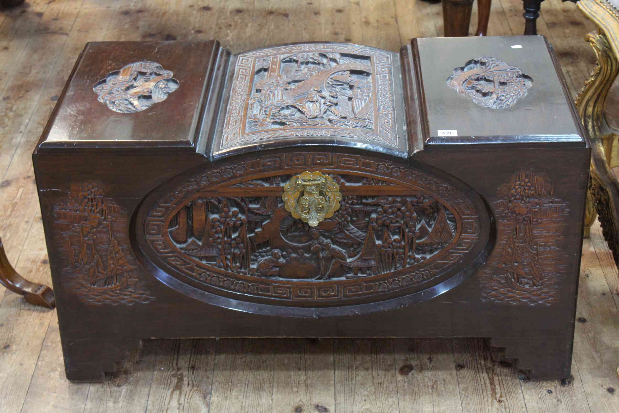 Oriental carved camphorwood trunk, 50cm by 93cm by 46cm.