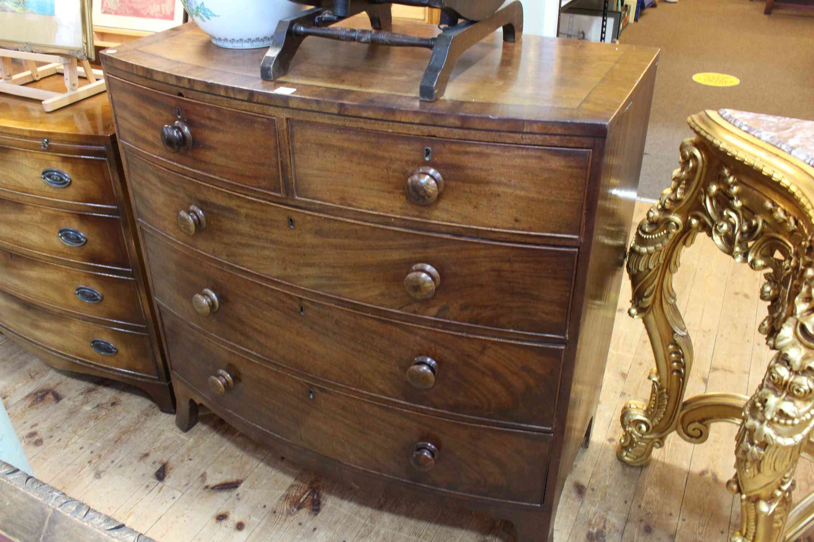 Victorian mahogany bow front chest of two short above three long graduated drawers on splayed
