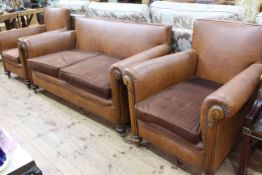 1920's/30's tan hide and studded three piece lounge suite.