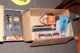 Box of model railway accessories including carriages, two diesel loco's, etc.