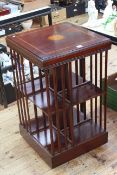 Edwardian style inlaid mahogany two tier revolving bookcase, 79cm by 47cm by 47cm.