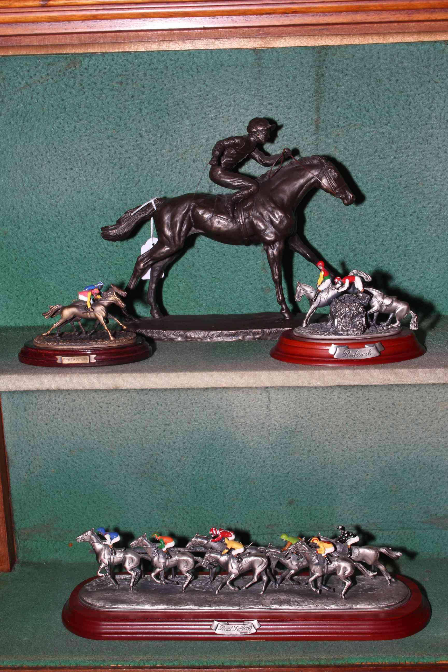 Four horse racing sculptures including bronzed effect Heredities DG16, Marks Models Ltd, etc.