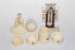 Box of old ivory and bone items including thermometer, egg box, figure, napkin rings, etc.