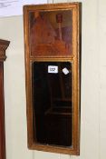 Gilt framed wall mirror with inset marquetry plaque depicting a traveller arriving at an inn,