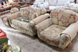 Four piece lounge suite comprising large two seater settee and three armchairs in floral pattern