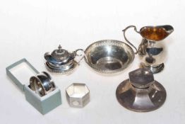 Six silver small items comprising cream jug, bon bon, mustard pot, inkwell and two napkin rings.