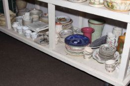 Various teapots, assorted dinner and teawares, owl ornaments, decorative plates, lamps, etc.