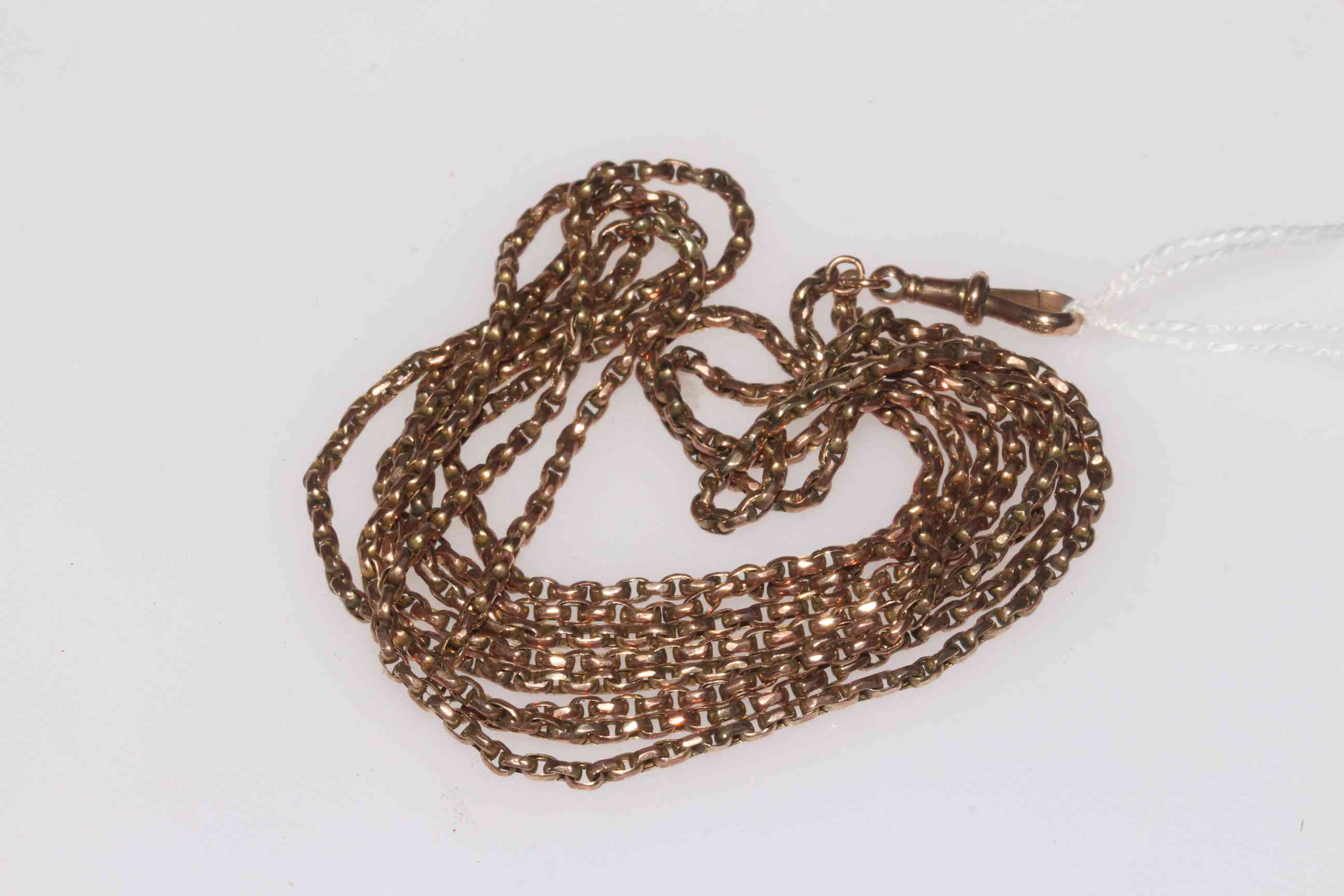 9 carat gold muff chain, 140cm length.