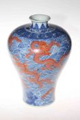 Large Chinese red dragon vase with continuous decoration on sea scroll ground, 34cm,