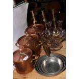 Three copper and brass twin handled pans, set of four graduated saucepans,