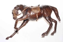 Leather tang horse, 33cm high.