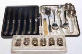 Cased pistol grip tea knives, five silver spoons, fork, tongs and open salts,