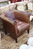 Laura Ashley tan leather club chair.