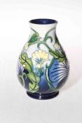 Moorcroft vase with stylised foliage decoration, bearing artists signature, 13.5cm, boxed.