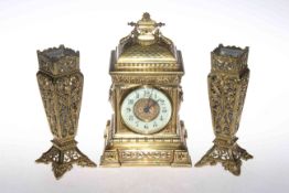 Ornate gilt metal three piece garniture clock set, clock 27cm high.