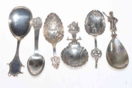 Collection of five Dutch and other silver caddy spoons, and other serving spoon (6).