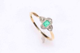 Emerald and diamond 18 carat gold and platinum ring, size P/Q.