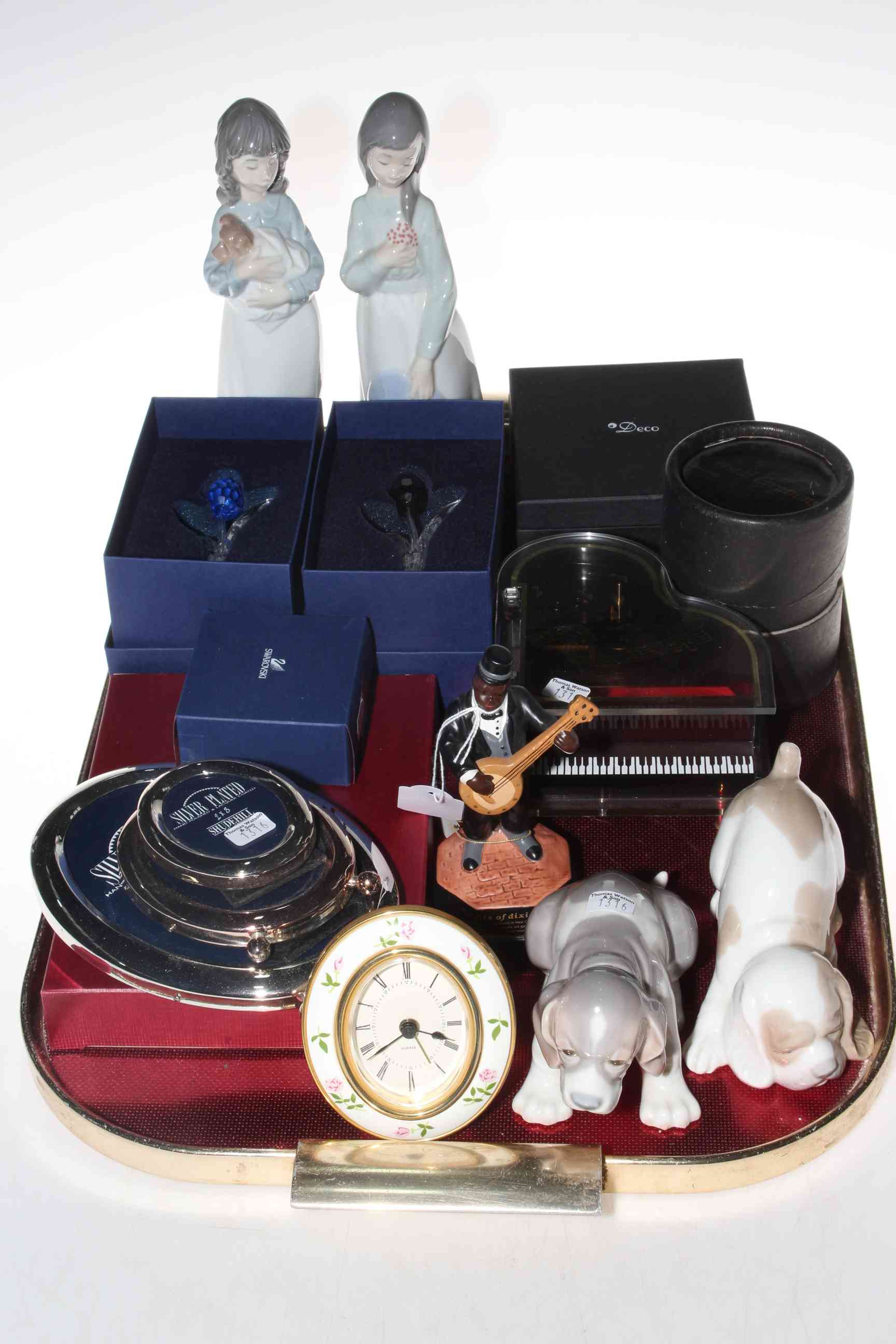 Lladro and Nao Dogs, two Nao figures, Swarovski flowers, two paperweights, clock, picture frames,