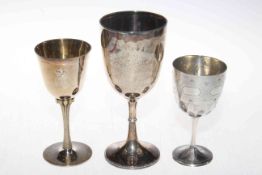Three silver goblets, two with inscriptions, the smallest 13cm, hallmarked London 1877.