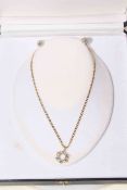 Diamond set 18 carat gold pendant with ring of six stone clusters and 18 carat gold chain necklace,