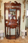 Late 19th/early 20th Century walnut mirror backed hallstand, 206cm by 96cm.