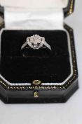 Diamond cluster 9 carat white gold ring, size K/L.