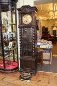 Early 20th Century carved oak triple weight longcase clock.