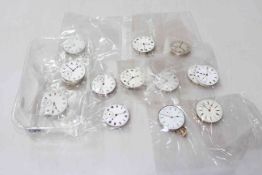 Collection of fourteen pocket watch movements.