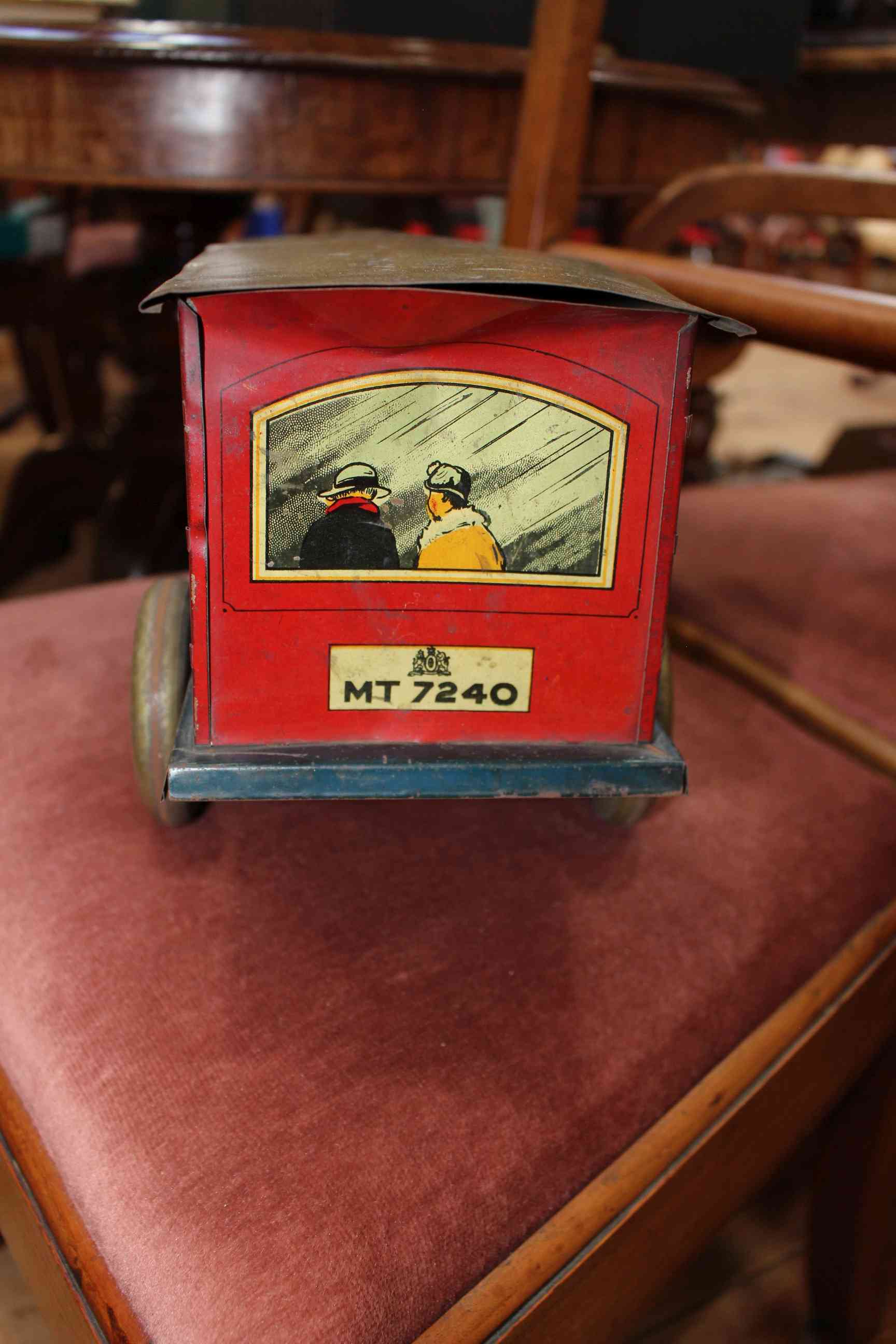 Swift tinplate bus with transfer decoration of passengers and conductor, 43cm length. - Image 4 of 5