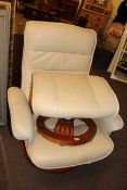 Stressless style adjustable swivel chair and footstool.