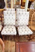 Set of four high backed scrolled leg dining chairs.