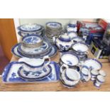 Booths Real Old Willow Pottery including tureen, teapot, dinner plates, approximately sixty pieces.