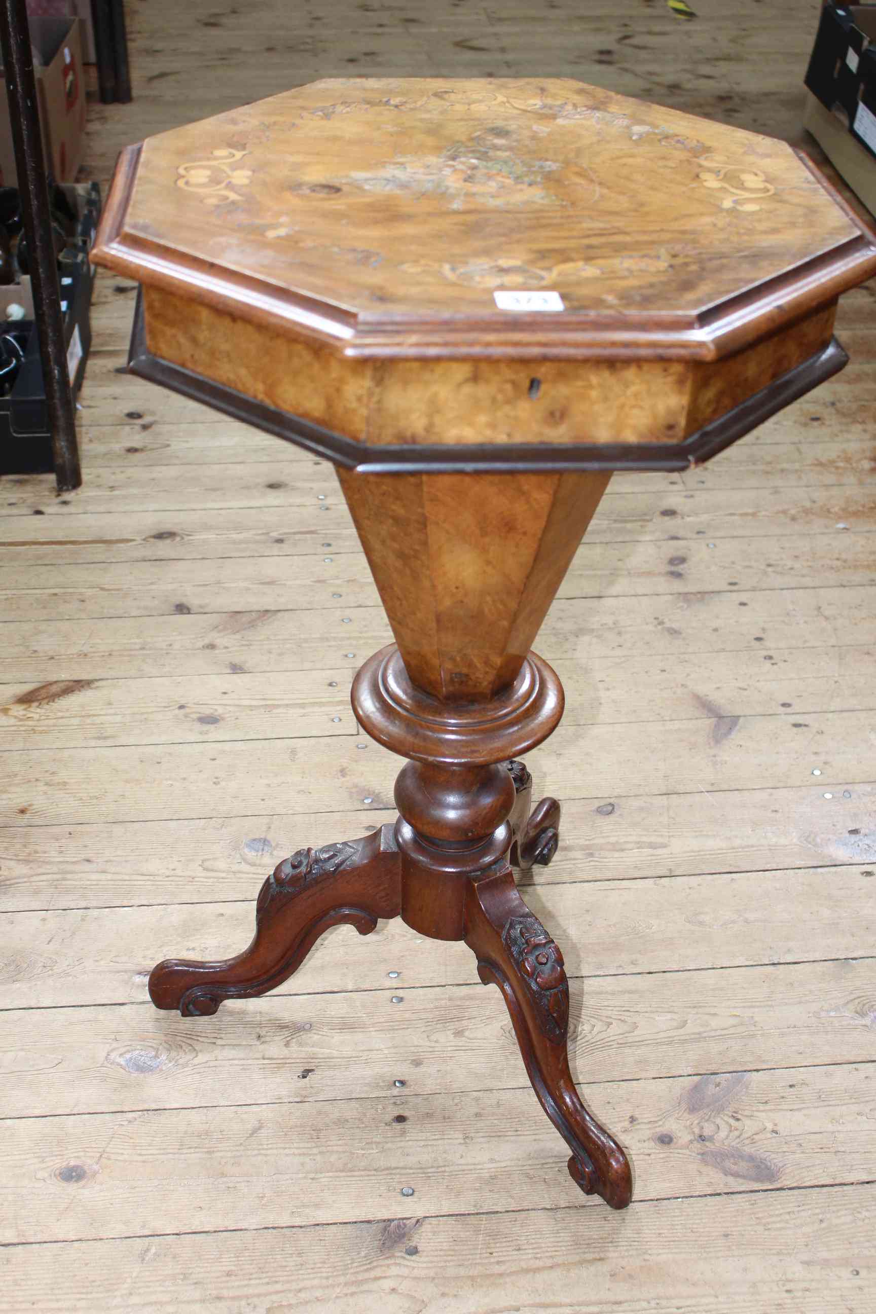 Victorian walnut and floral inlaid octagonal sewing table on tripod base, 70cm by 45cm.